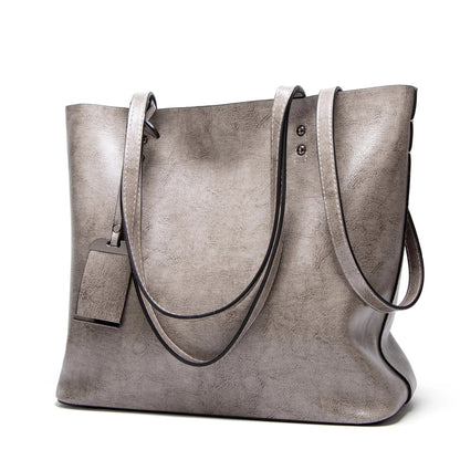 LEATHER CROSSBODY TOTE BAG